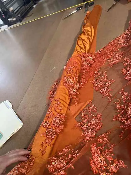 Lace appliqué placed by hand
