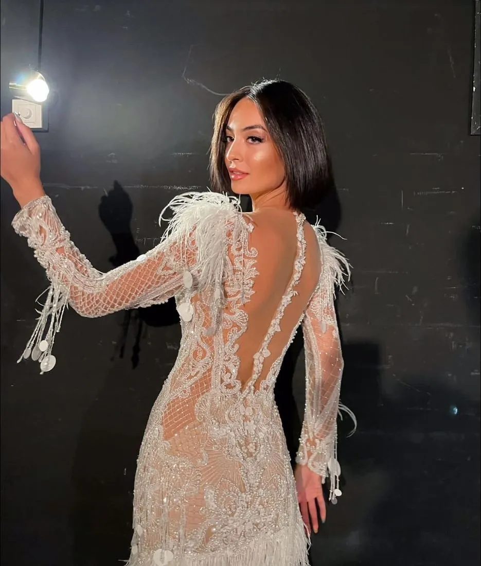 Feathered Illusion Gown by Karmen Aksu
